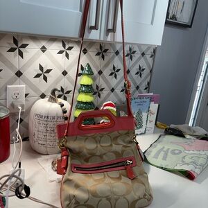 Coach Bonnie Cashin folderover/ crossbody orange & signature tan